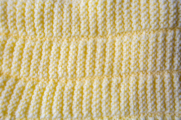 Knitted texture. Pattern fabric made of wool. Background, copy space. Handmade sweater texture, knitted wool pattern