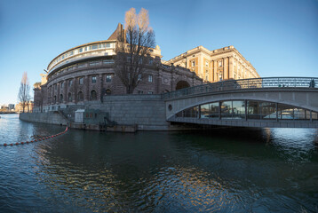The government house at the canal Stallkanalen, a low winter solstice a sunny and snowy day in Stockholm
