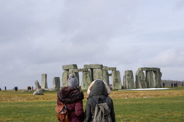 Stonehenge , World wonder historic stone monuments near Salisbury during winter cloudy day at...