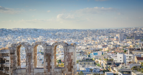 View of modern city of Athens and ancient arches