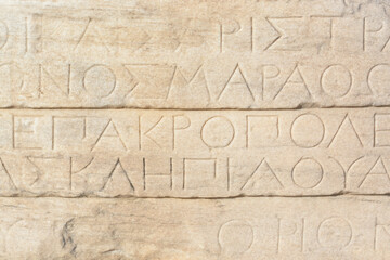 Ancient Greek inscription on marble in the Acropolis of Athens