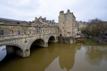 Pulteney Bridge , Classic Bridge over river Avon in Bath old town during winter evening at Bath , United Kingdom : 5 March 2018