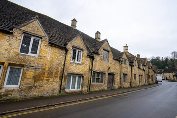 Castle Combe , Beautiful village in Cotwolds with old stone houses bridge and river during winter in Wiltshire , United Kingdom : 6 March 2018
