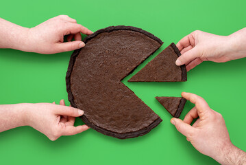 Pie chart concept, people sharing chocolate cake, above view on a green background. - obrazy, fototapety, plakaty