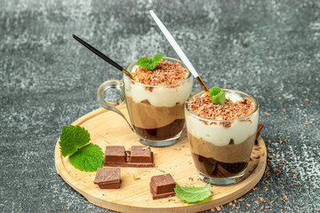 Delicious homemade mousse Three chocolate in jars, Restaurant menu, dieting, cookbook recipe top...