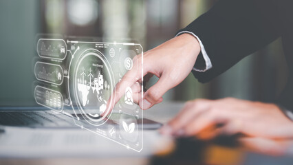 protecting the environment alternative energy Sustainable renewable energy sources Green energy innovation and environmentally friendly energy technology,Businessman checking work on laptop