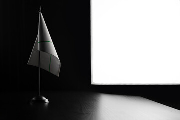 Small national flag of the Mercosur on a black background