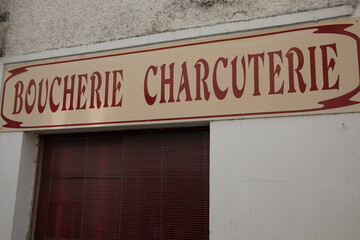 boucherie charcuterie old vintage text on retro facade of means french butcher delicatessen shop in france city