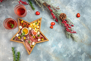 Assorted cheeses and deli meat appetizers. Festive Appetizer for christmas table. place for text, top view