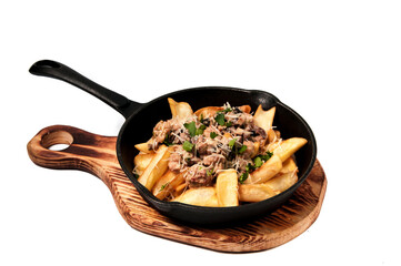 fried potatoes in a pan isolate
