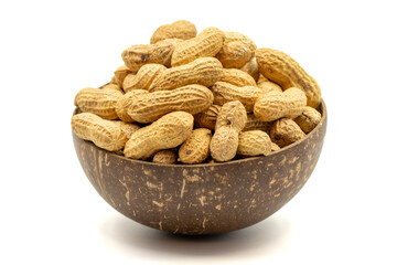 Peanuts in shell isolated on white background. Peanuts in a coconut bowl. close up