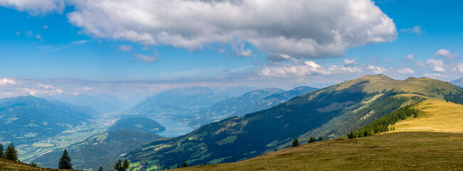Panoramic view of Lake Millstatt, Hohe Tauern Mountains and Drava river valley from Palnock (1901 m), to the right is Mount Mirnock , Gurktal Alps, Carinthia, Austria.