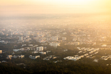 Obraz premium Aerial view of Chiangmai with PM 2.5 pollution covering the city.