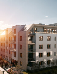 New modern apartment complex. Low-rise European apartment building complex with outdoor facilities.