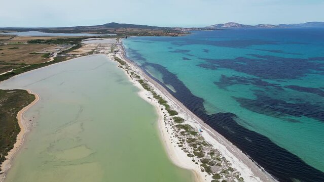 Big Salt Lake and Bagno Sardigna Beach in Stintino, Sardinia, Italy - 4k Aerial