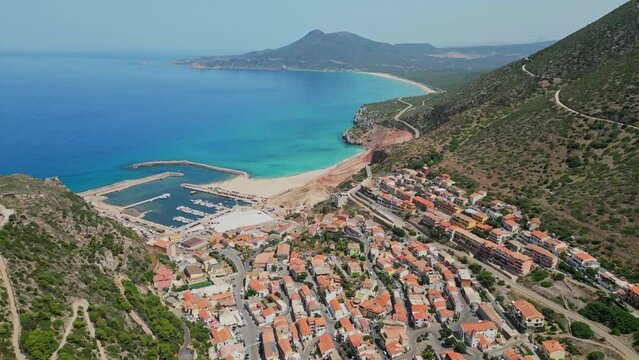 Buggerru mining and coastal village at West Coast of Sardinia, Italy - 4k Aerial