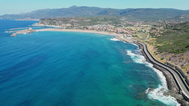 Coastal Road and Blue Bay at Bosa Marina, Sardinia, Italy - 4k Aerial