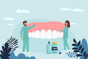 Dental clinic and healthcare concept. Woman and man dentists cartoon characters standing examining state of huge human tooth together vector illustration