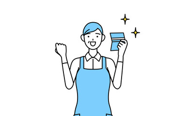 預金通帳を見て喜ぶエプロンを着たシニア女性