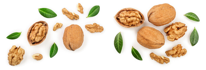Walnuts with leaf isolated on white background. Top view. Flat lay