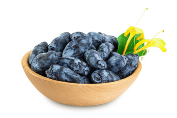 Fresh honeysuckle blue berry in wooden bowl isolated on white background with full depth of field