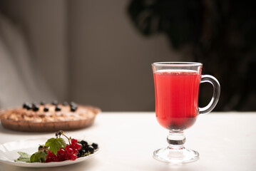 juice, a drink of black and red currants in a glass