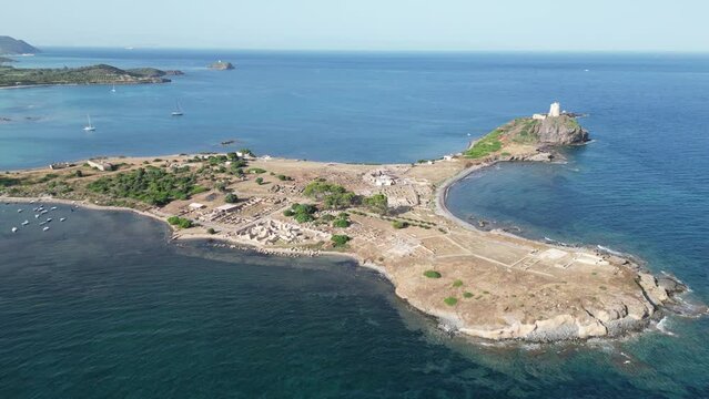 Nora Peninsula and Archeological site with ancient Roman ruins in Sardinia, Italy - Aerial