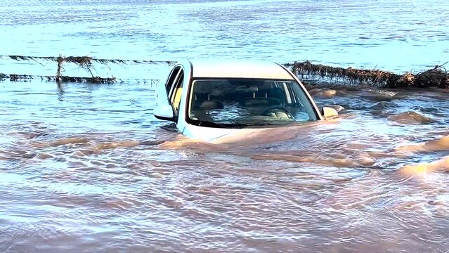 cars stranded in heavy flood waters