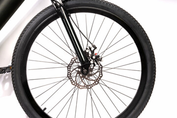 Disk Brake and Wheel of Black Mountain Bike isolated on white, Mountain Bicycle Isolated on White background.