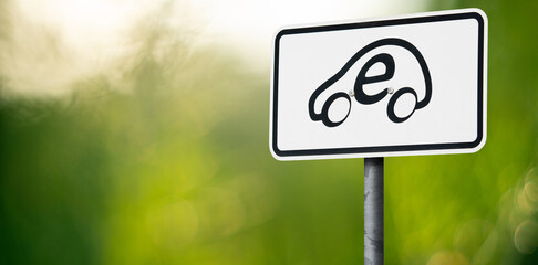 Road sign with electric car symbol	