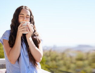 Woman, coffee and relax outdoor for calm freedom, peace travel vacation or summer holiday in nature with closed eyes. Sunshine, drinking tea and young girl relaxing, thinking and breathing fresh air
