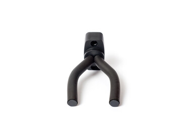 Obraz premium Wall mount for an acoustic or electric guitar, shot against a white background.