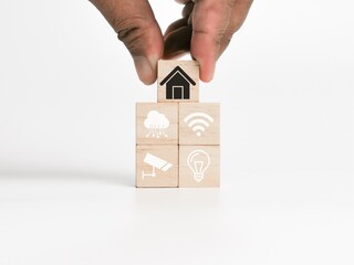 Smart home concept with icons and hand.