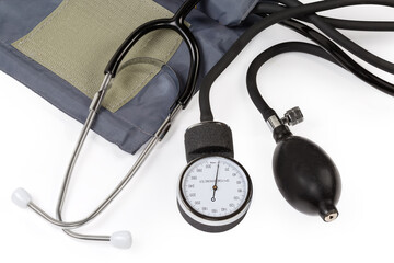 Parts of the mechanical aneroid sphygmomanometer and stethoscope close-up