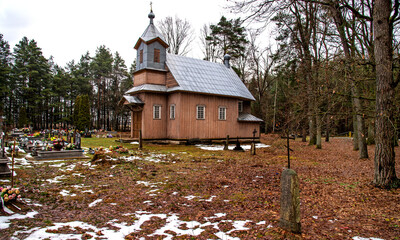 Built in 1894, a wooden Orthodox cemetery chapel of the Sacrifice of the Most Holy Mother of God near the village of Trześcianka in Podlasie, Poland.