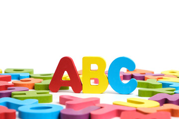ABC letters English alphabet among multicolored letters white background.