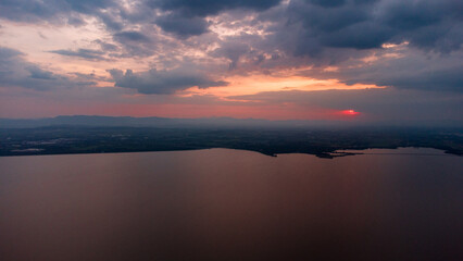 Over the dam and large river in Pasak dam in Thailand during the rainy season with a flood pandemic.