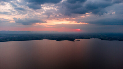 Fototapeta premium Over the dam and large river in Pasak dam in Thailand during the rainy season with a flood pandemic.