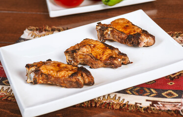 Caucasian shashlik plate with grilled meat .  pork bbq