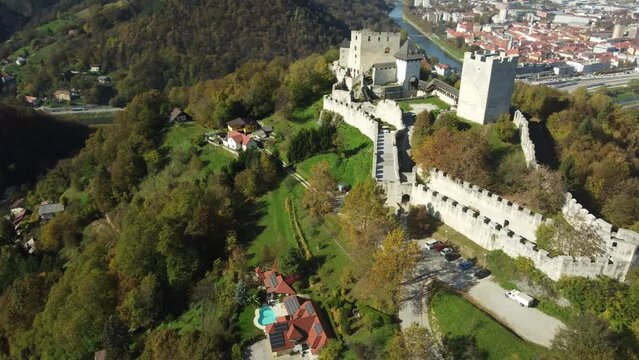 Drone footage of Celje Castle in Celje, Slovenia with a view of the cityscape of Celje town. Aerial.