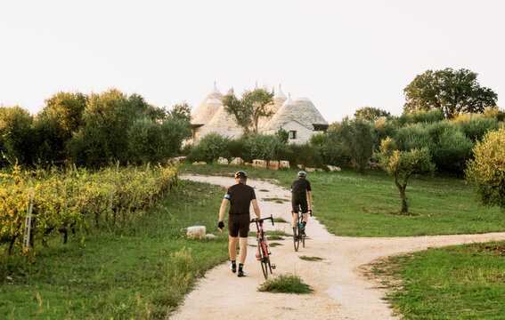 Road Cyclists on Gravel Road