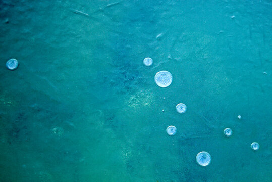 Full frame of frozen water in lake