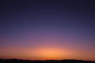 A calming purple and orange sunset over Antelope Valley, California.
