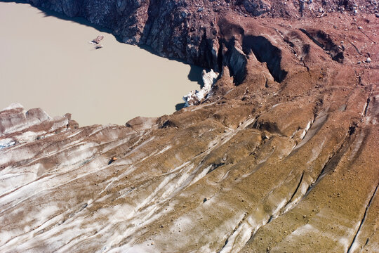 A silty glacier-dammed lake of the Brady Glacier, Glacier Bay National Park, Alaska.
