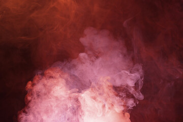 Yellow and pink steam on a black background.