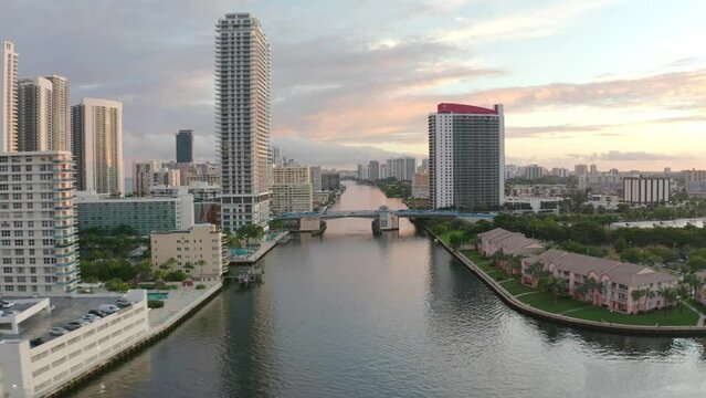 Amazing Fly Over of Miami Florida Resorts Fly Towards Bridge Above Canal and Hotels