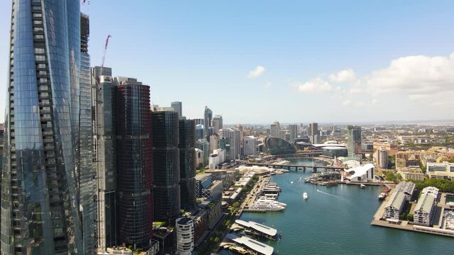 Aerial drone view of Barangaroo waterfront precinct in Sydney City, NSW looking toward Darling Harbour on a sunny morning    