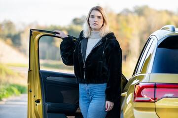 Young woman and car.