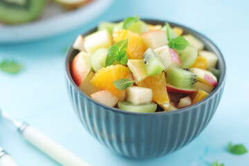 A bowl with fresh fruit salad