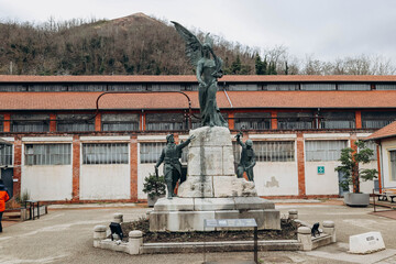 Saint Etienne, France - 30.12.2022: Central courtyard with sculpture at the old coal mine "Couriot" in Saint-Étienne